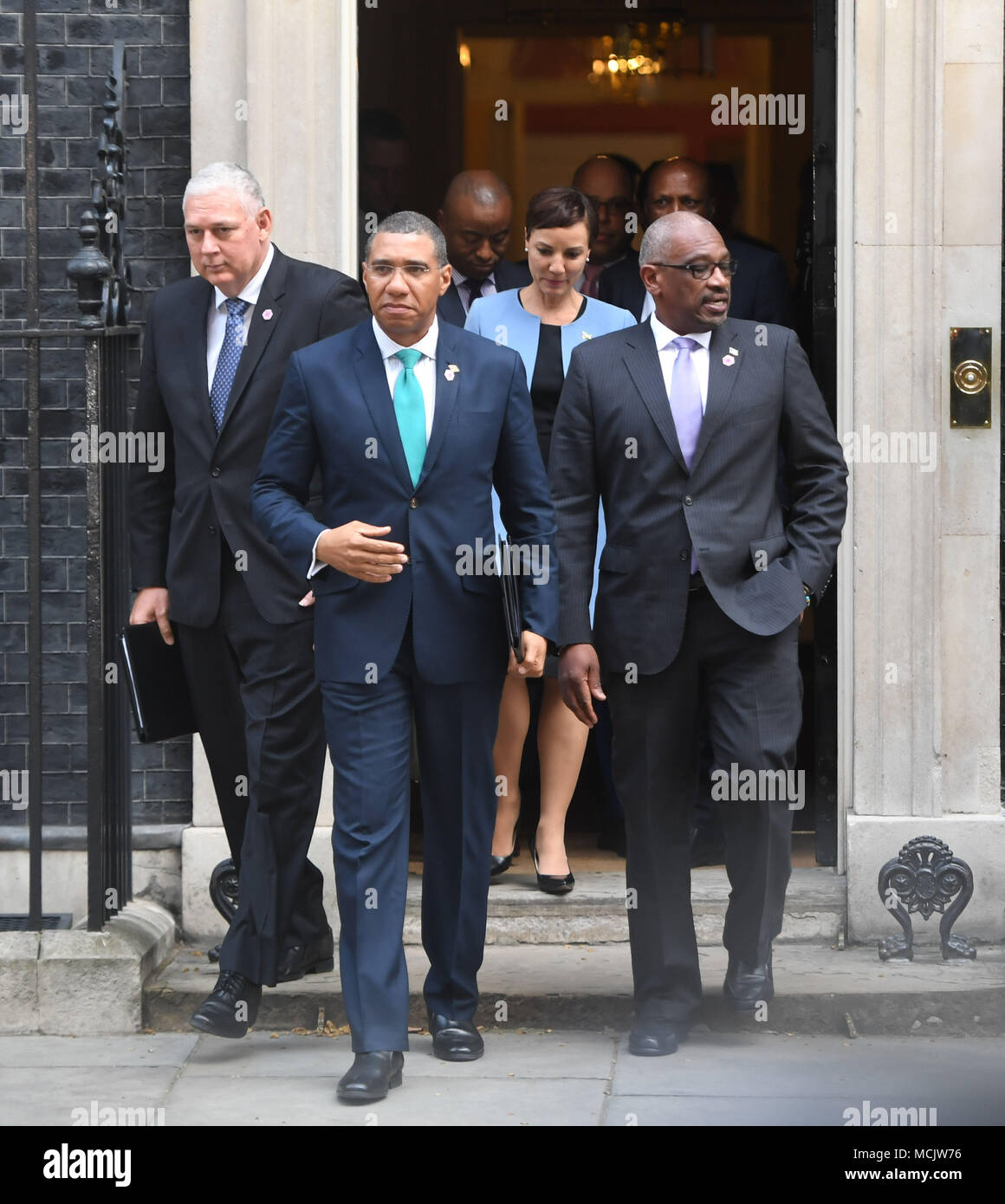 The Prime Minister of Jamaica Andrew Holness, with other members of the delgation, leaving 10 Downing Street after the meeting with Prime Minister Theresa May in relation to the Windrush generation immigration controversy. Stock Photo