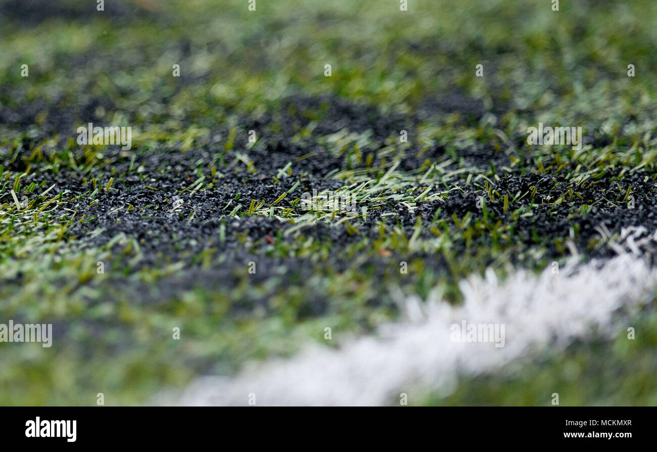 Rubber crumb pellets on an artificial football pitch Stock Photo