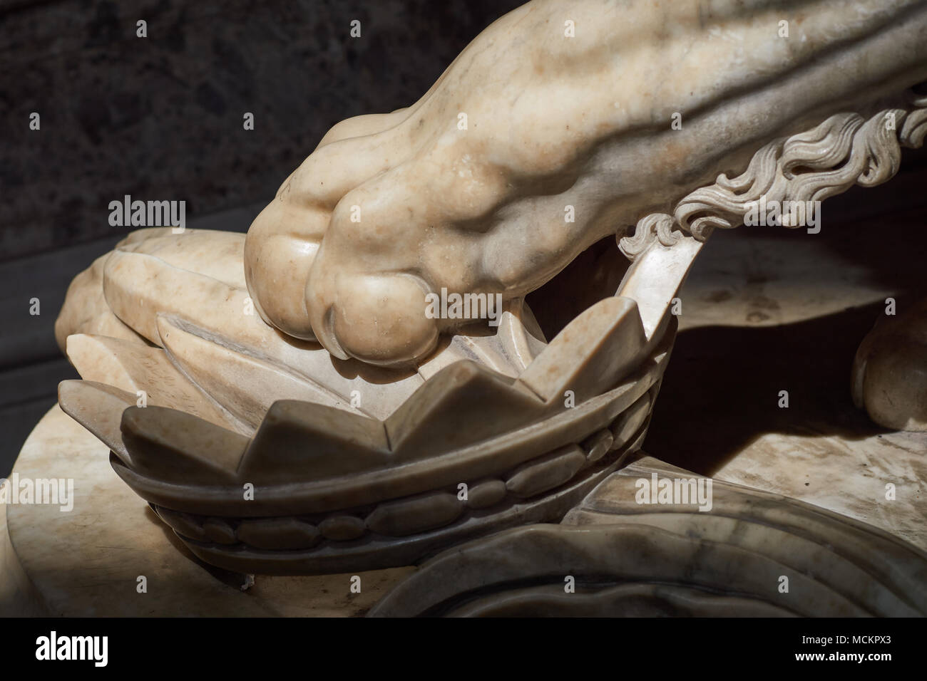 Closeup of a marble lion paw with king's crown - Grand staircase, Royal Palace of Caserta ('Reggia di Caserta'), baroque art, Napoli, Italy Stock Photo