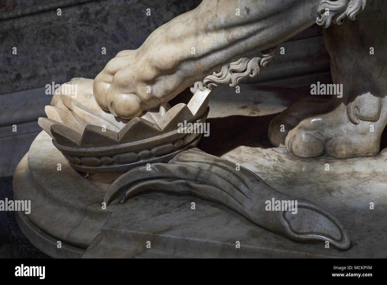 Closeup of a royal marble lion paw with crown - Grand staircase, Royal Palace of Caserta ('Reggia di Caserta'), baroque art, Napoli, Italy Stock Photo