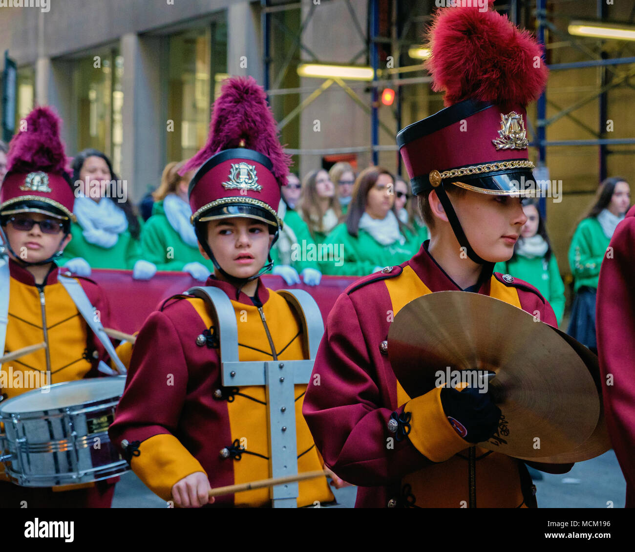 Three students from St Raymond School Band, East Rockaway, NY, with