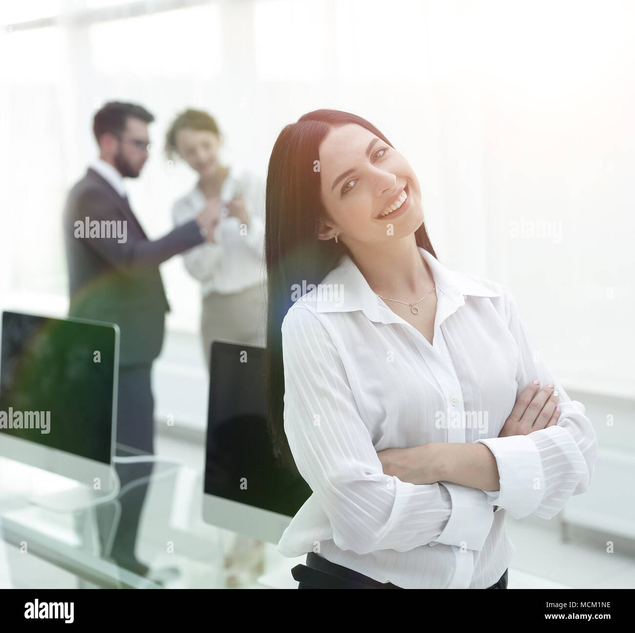 successful young business woman on the background of a workplace Stock ...