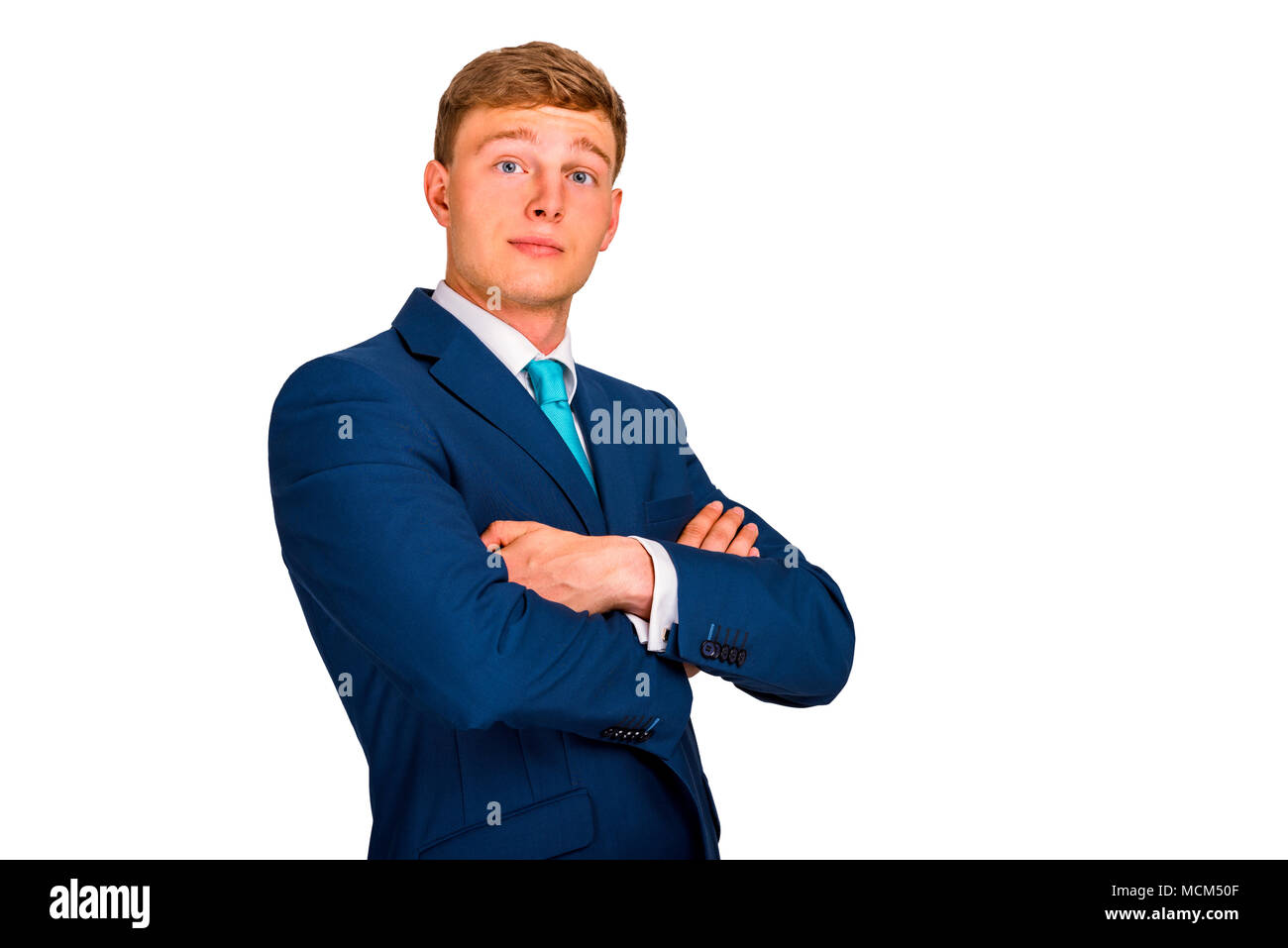 Portrait of a handsome smiling business man, in blue suit, isolated on white background Stock