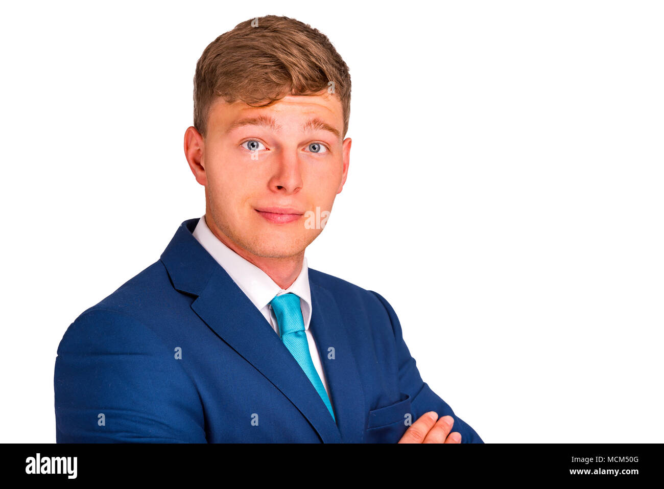 Friendly and smiling businessman looking at camera, isolated on white ...