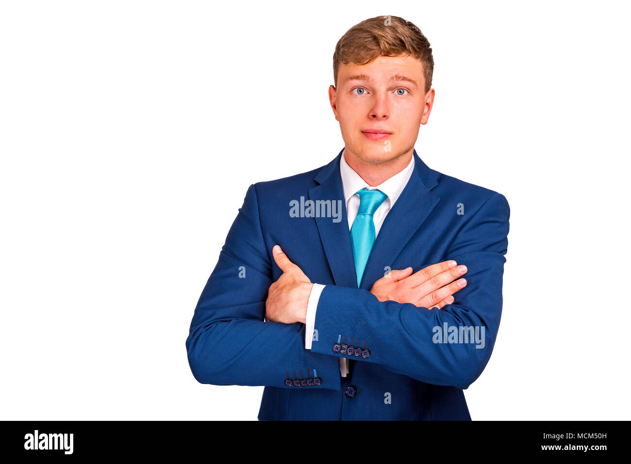 Friendly and smiling businessman looking at camera, isolated on white ...
