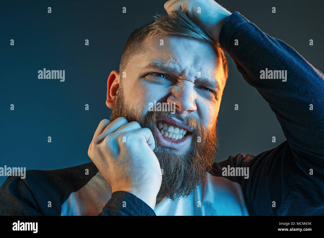 The anger and screaming man Stock Photo - Alamy
