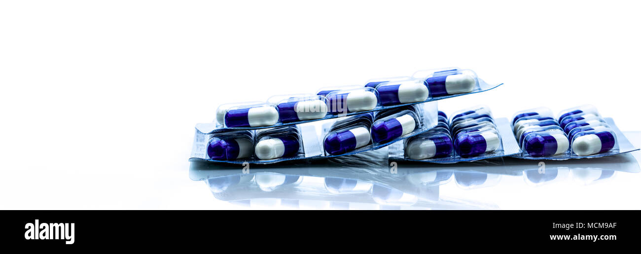 Fluconazole Antifungal medicine. Heap of pills in blister packs on