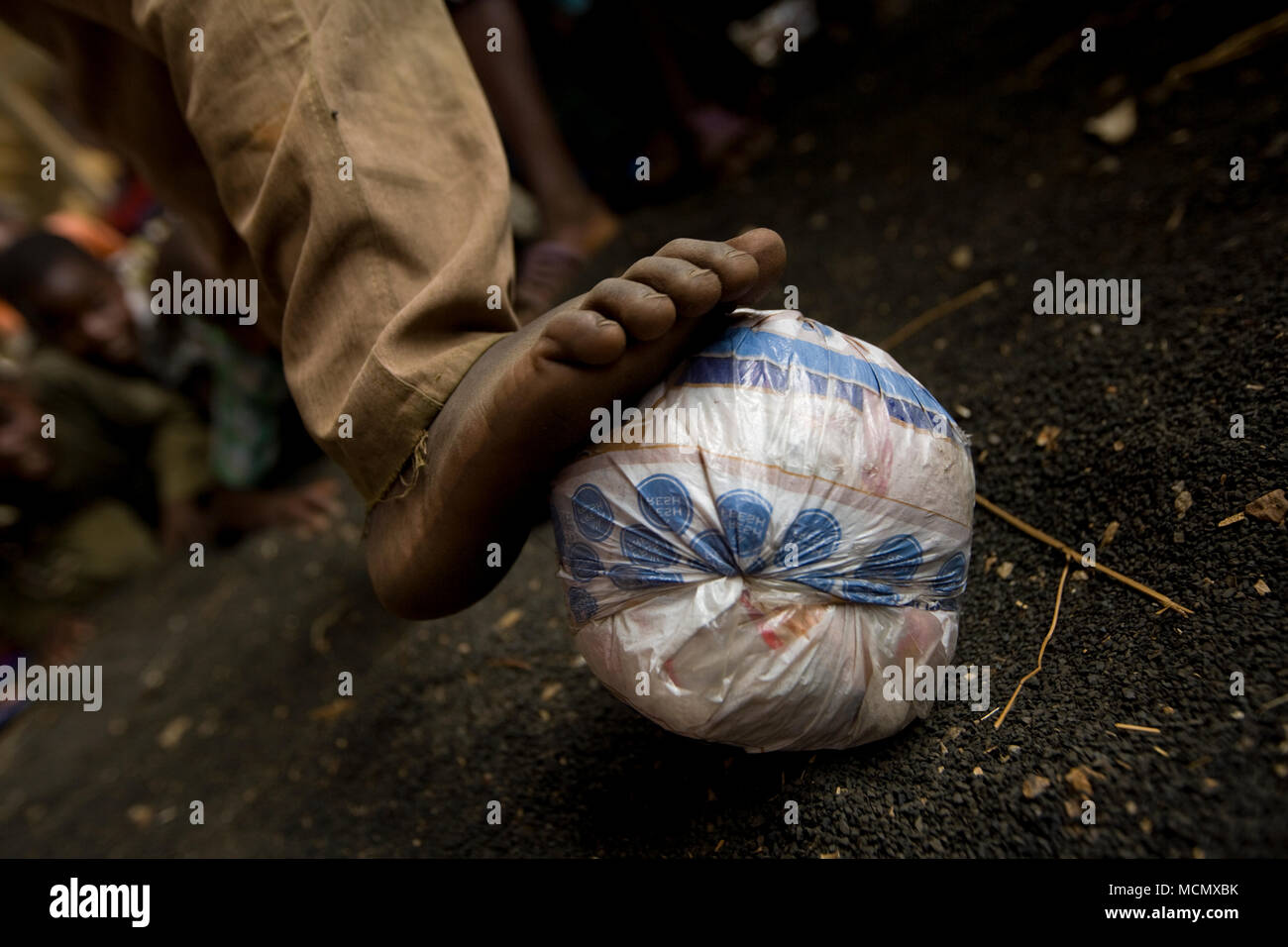 A boy and his soccer ball, Harare, Zimbabwe Stock Photo