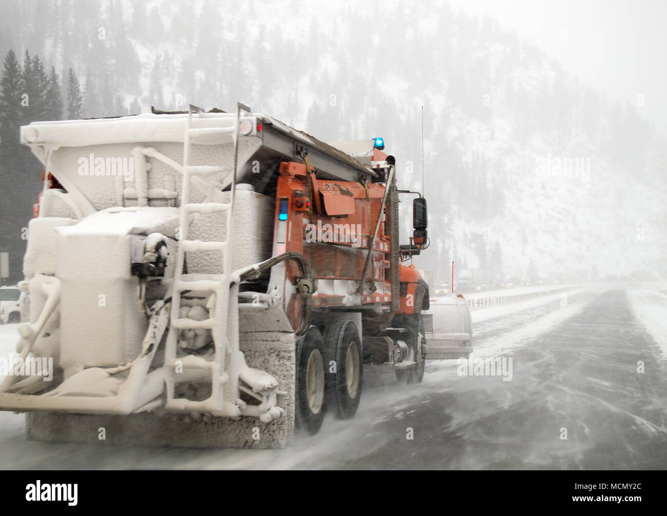 Colorado, snow plow on snow covered highway Stock Photo Alamy