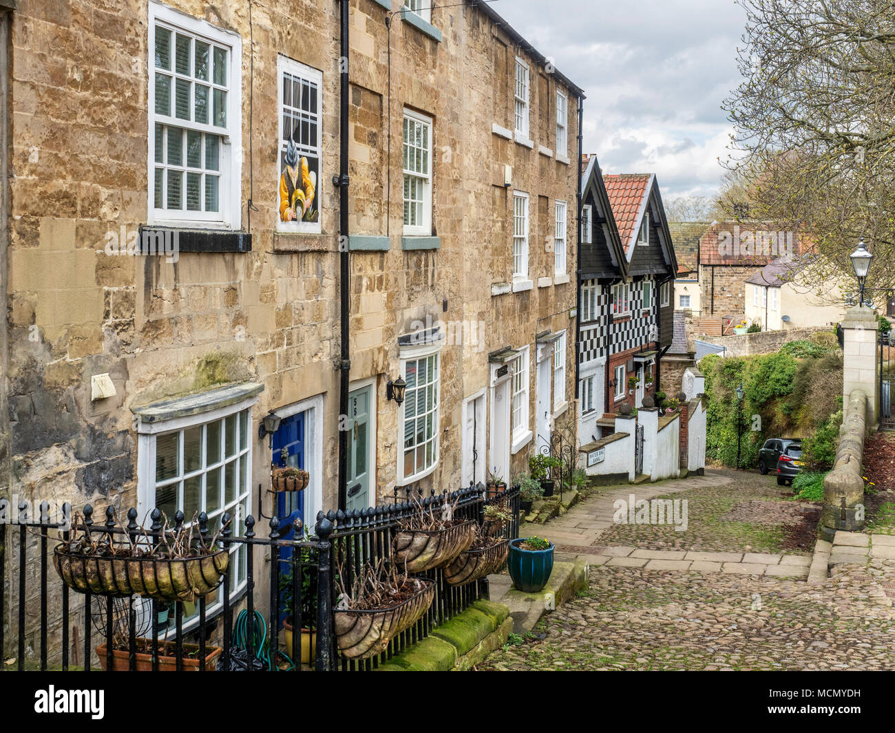 Buildings on Kirkgate and Water Bag Bank cobbled street at Knaresborough North Yorkshire England Stock Photo