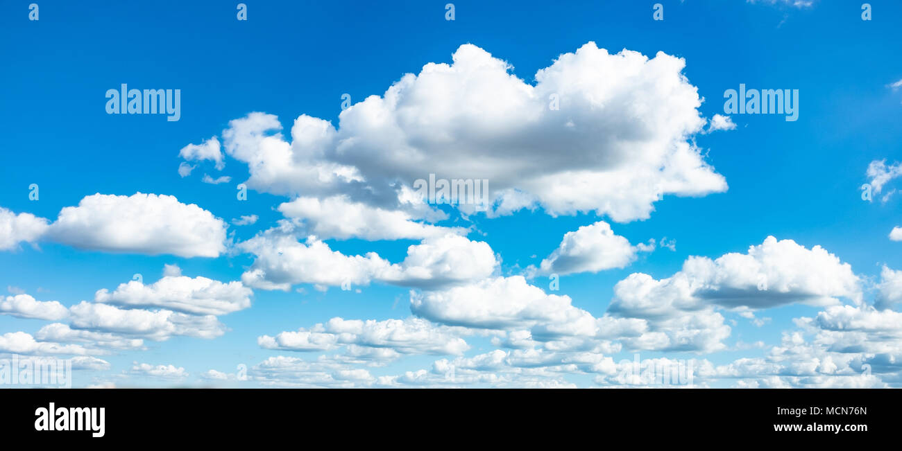 Blue vivid sky with white clouds, background Stock Photo - Alamy