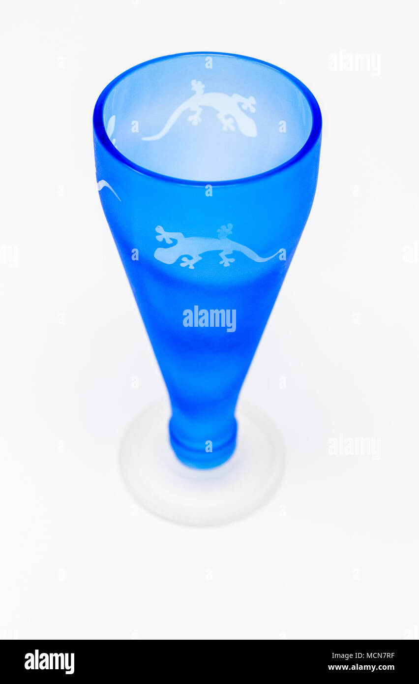 Blue frosted drinking glasses made from recycled glass bottles. Stock Photo