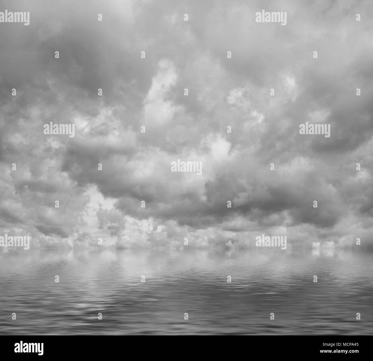 Grey clouds flying over sea, cloudscape. Dramatic cloudy sky, heaven