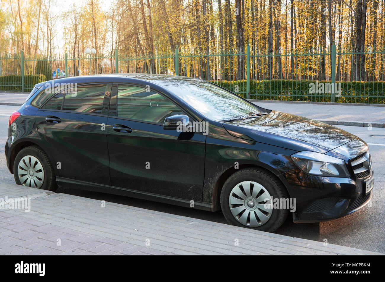 Moscow, Russia - May 29, 2017: New luxury  Mercedes Benz A-Class parked on street near city park. Stock Photo