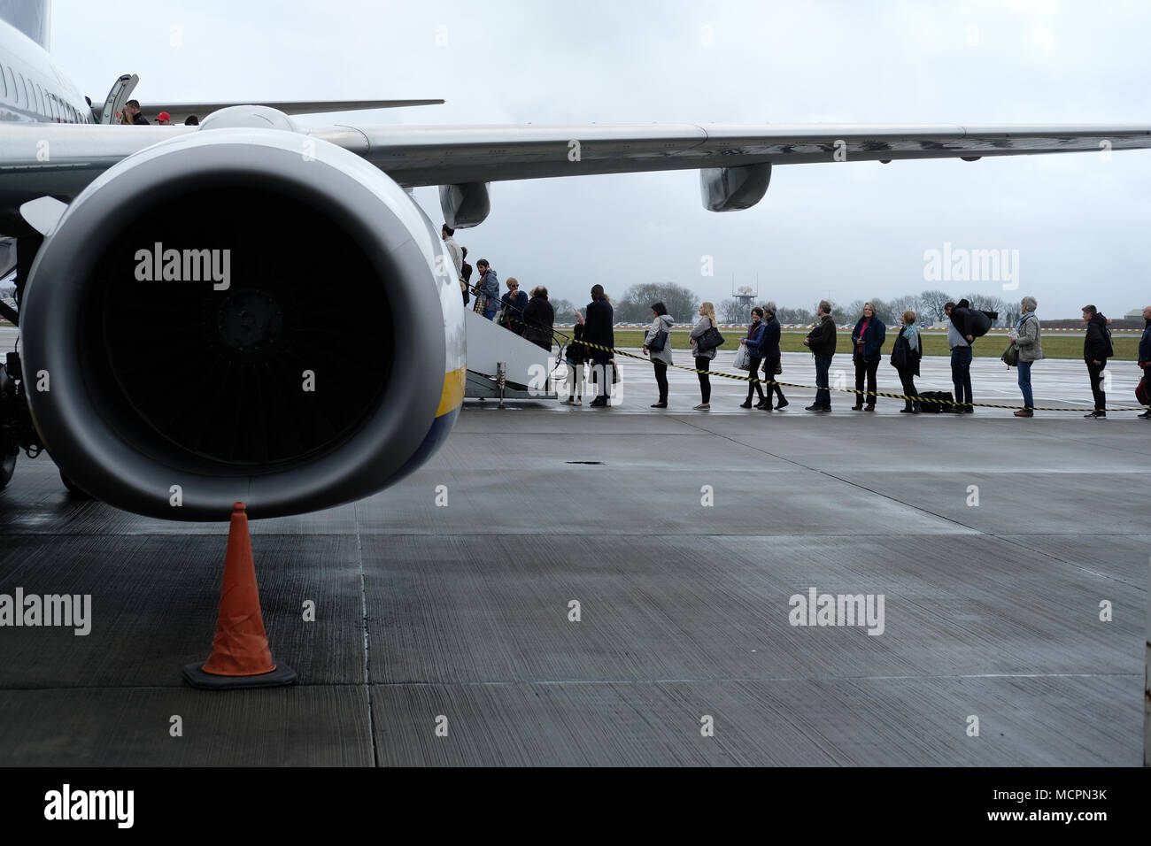 Passengers boarding a Ryanair plane at Bristol Airport. Stock Photo