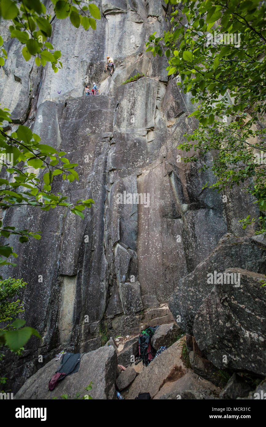 A group of three rock climbing at Index lower town wall near Index