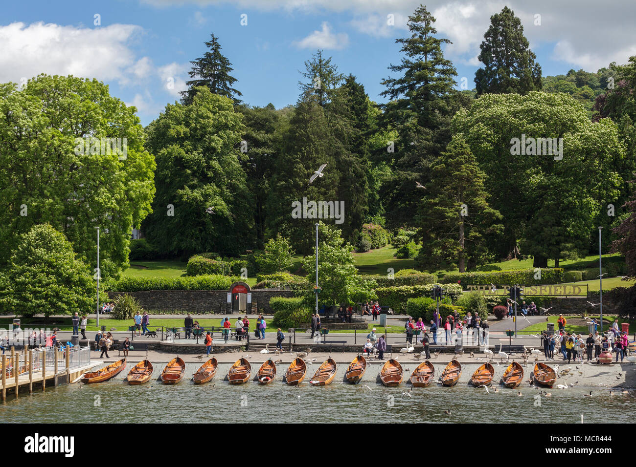 Wooden Rowing Boats on the Shore of Lake Windermere at Bowness on Windermere Cumbria Stock Photo