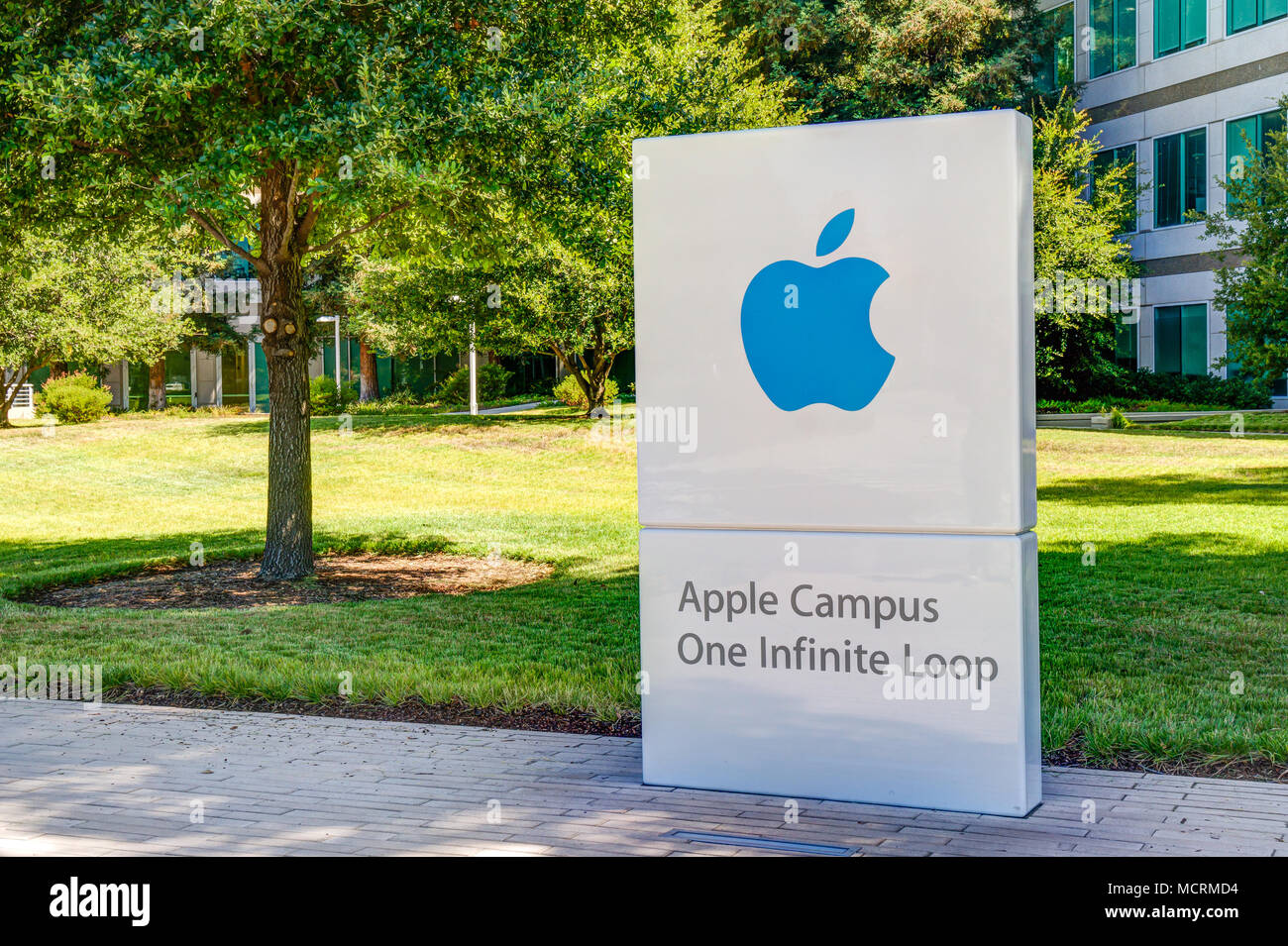 CUPERTINO, CA/USA - JULY 29, 2017: Apple Computer headquarters exterior and logo. Apple Inc. is an American multinational technology company. Stock Photo