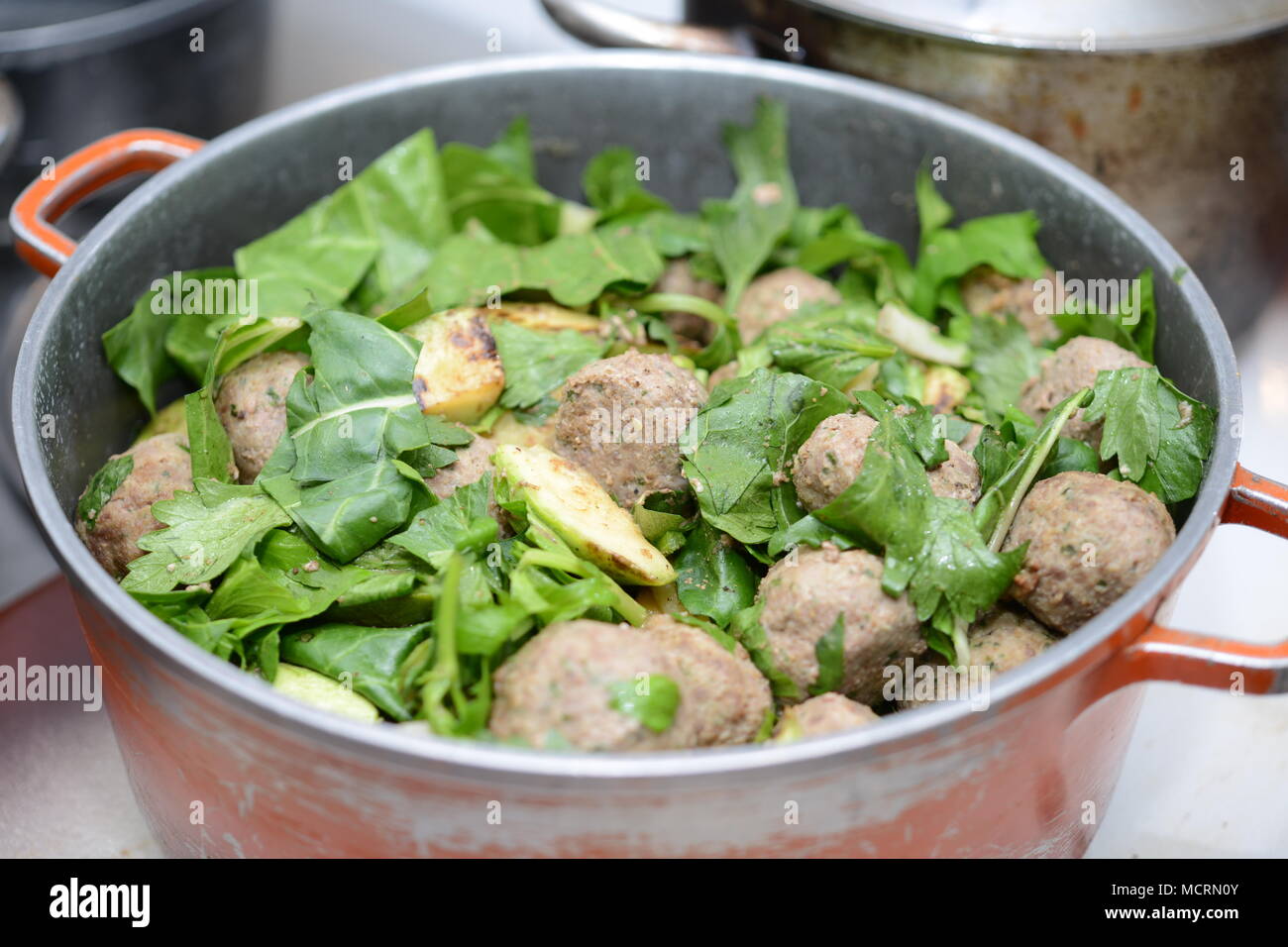 Cooking meatballs - Meatballs cook in a pot Stock Photo