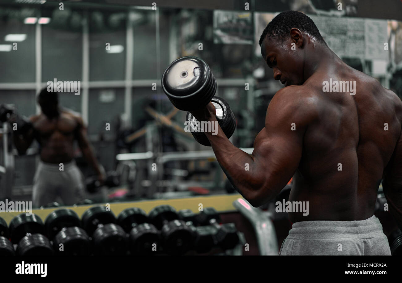 black athlete trains in the gym Stock Photo - Alamy