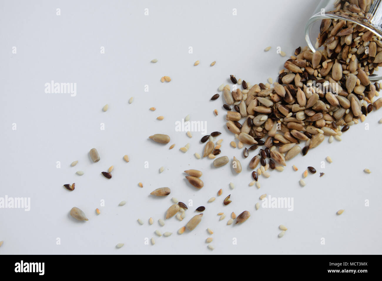 Top view of toasted mix of seeds sunflower, lin and sesame seeds