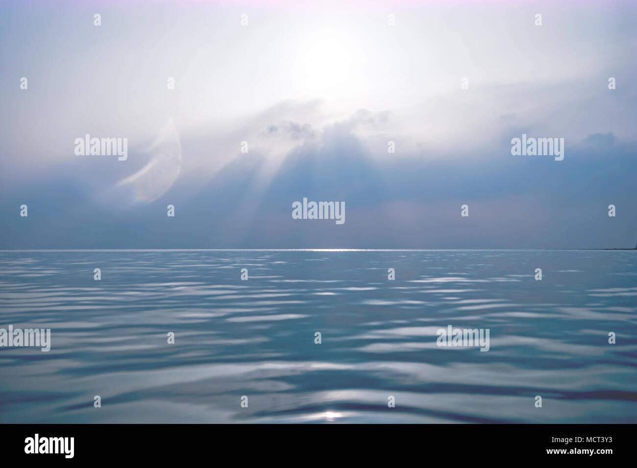 Blue sky with clouds over beach hi-res stock photography and images - Alamy