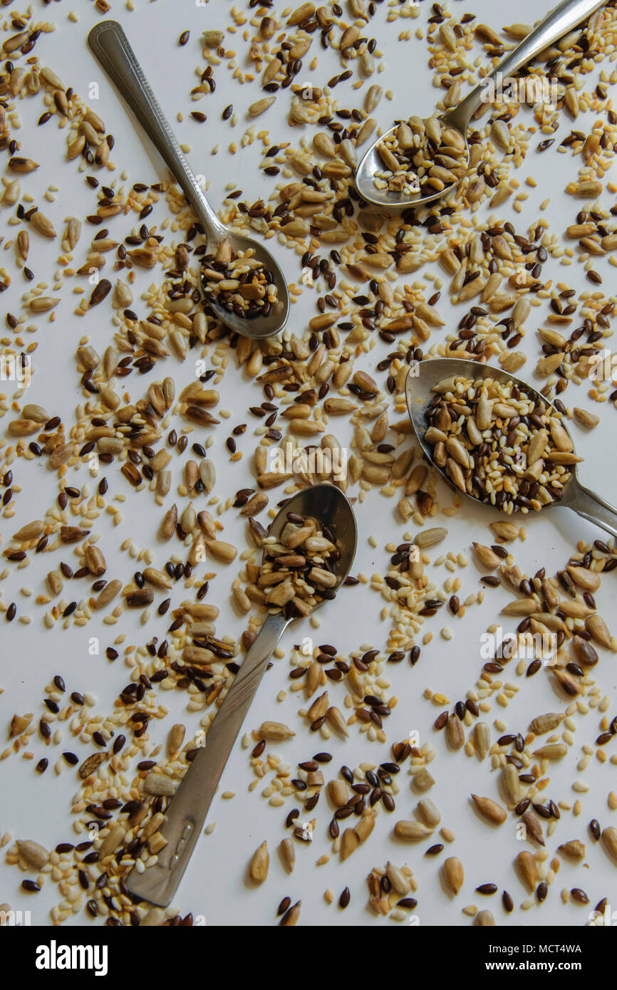Top view of toasted mix of seeds sunflower, lin and sesame seeds