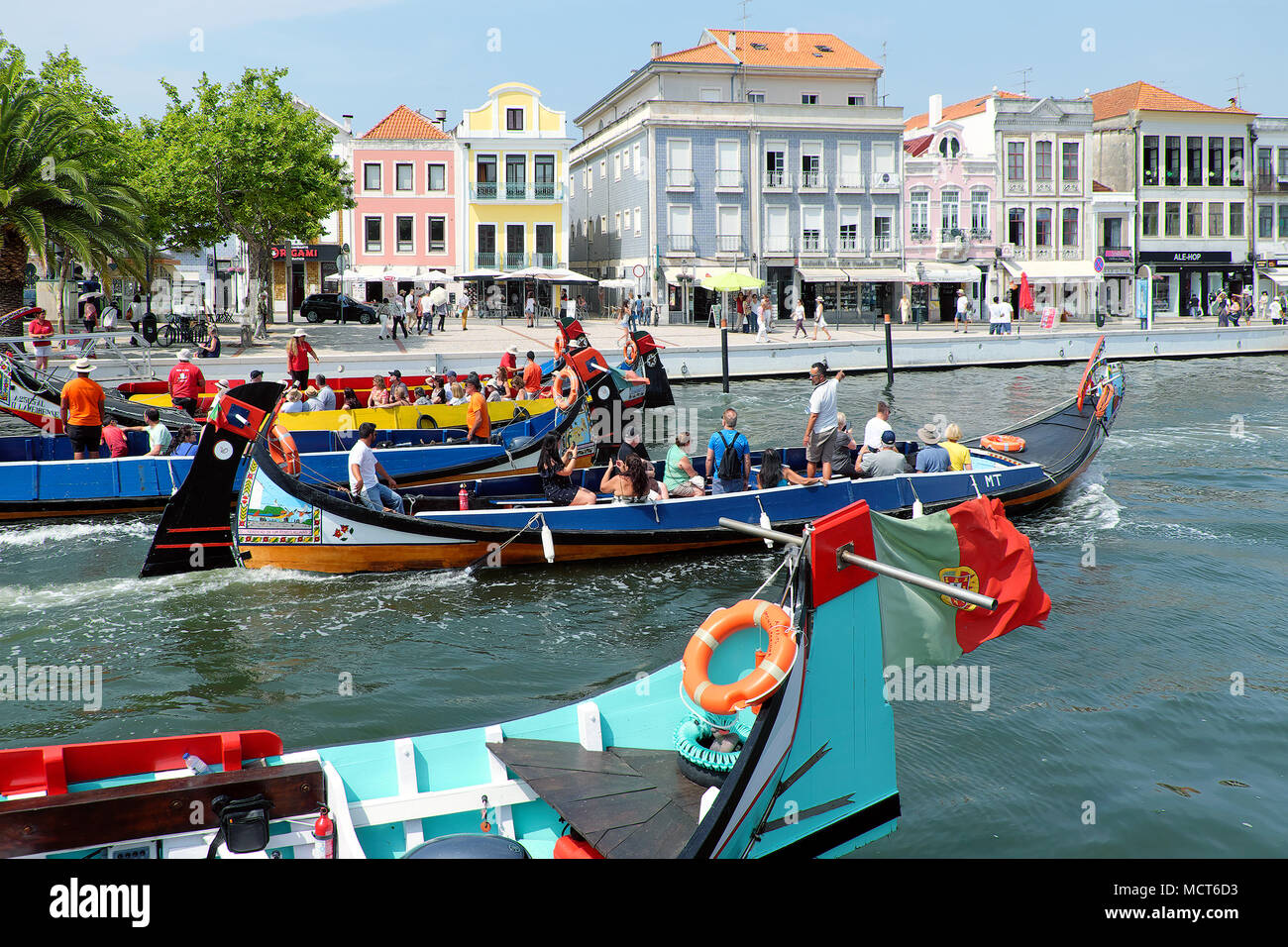 Tourists on a moliceiro boat canal trip, Aveiro, Centro Region, Portugal Stock Photo