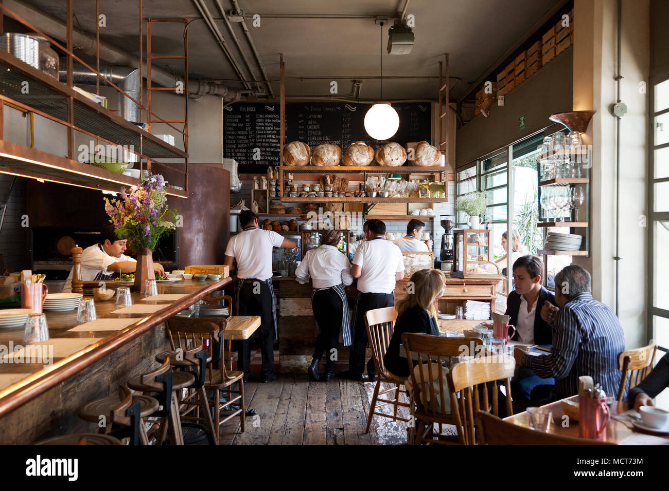 Servers working at the popular bakery counter in Lardo. Lardo, Mexico