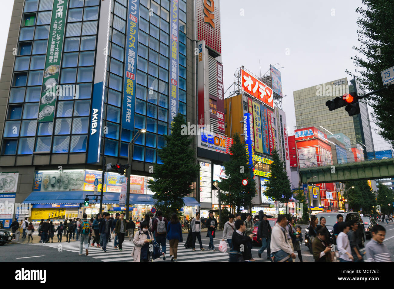 Akihabara streets with stores and people, a shopping district for video games, anime, manga, and computer goods in th Stock Photo