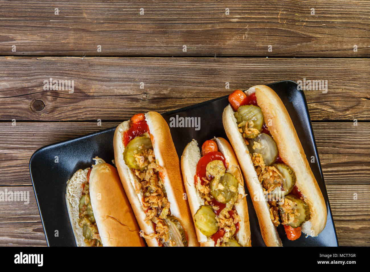 American hot dog with pickles,onions, ketchup and mustard Stock Photo Alamy