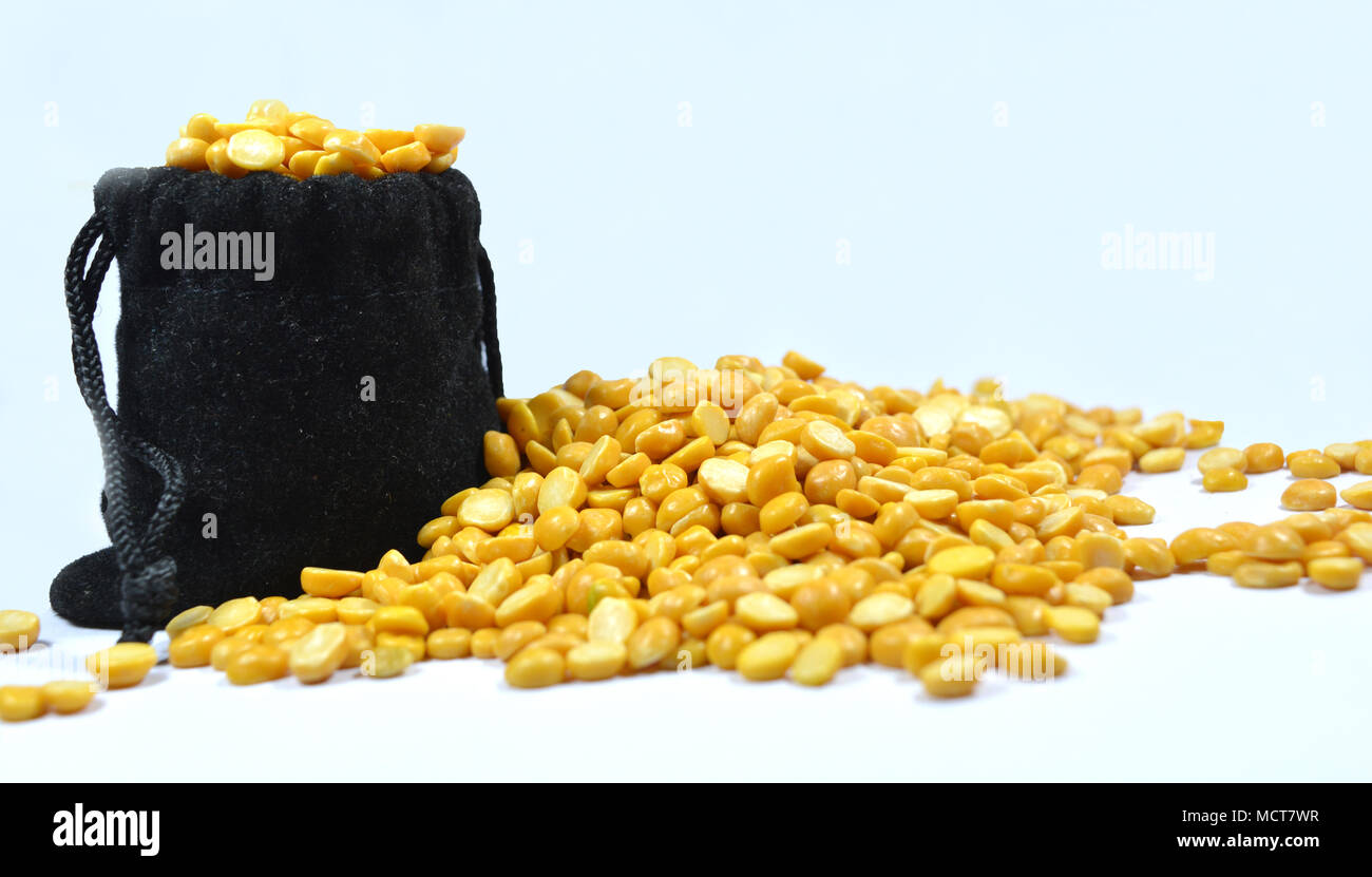 Full of Arhar or masoor Dhal or Toor Dal Pigeon Pea in the bag. Stock Photo