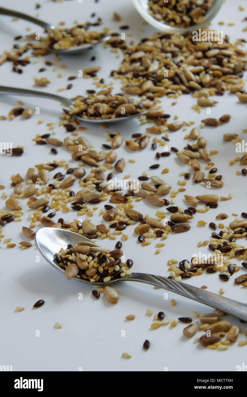 Top view of toasted mix of seeds sunflower, lin and sesame seeds