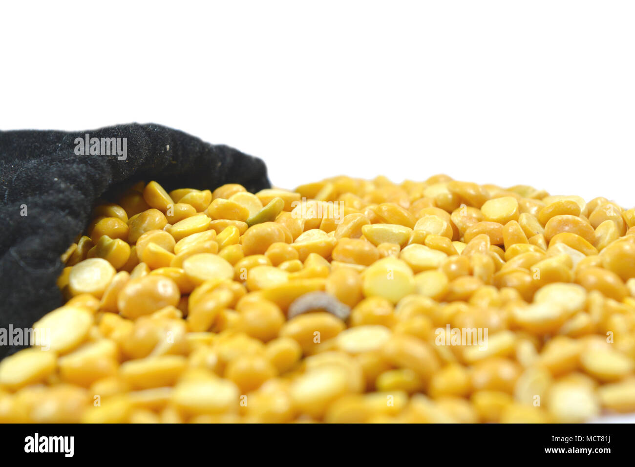 Full of Arhar or masoor Dhal or Toor Dal Pigeon Pea in the bag. Stock Photo