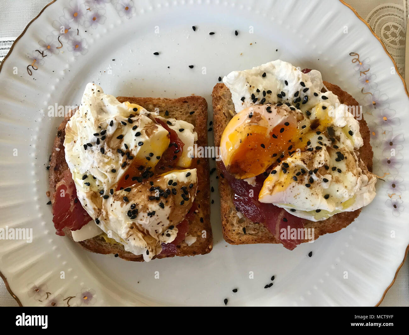 Poached Egg on Toast Bread with Cheddar Cheese, Balsamic Vinegar, Salad