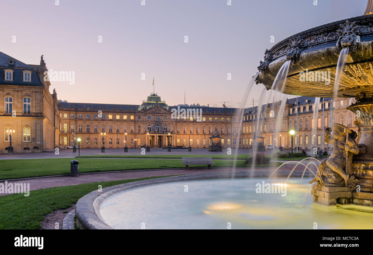 Stuttgart: Schlossplatzspringbrunnen and Neues Schloss (new palace) in the early morning. Stock Photo