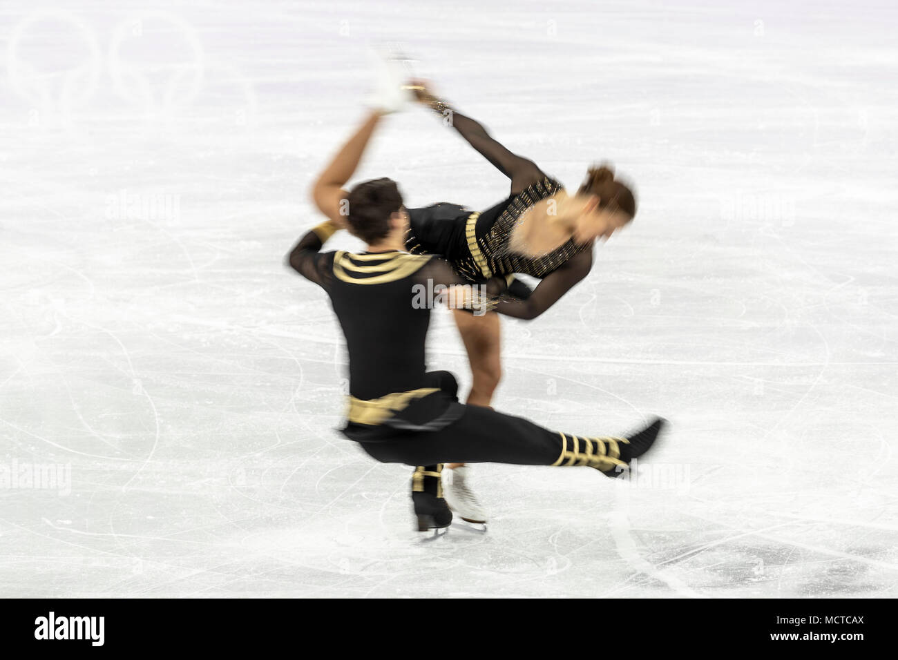 Motion blur action of Alisa Agafonova/Alper Ucar (TUR) in the Figure