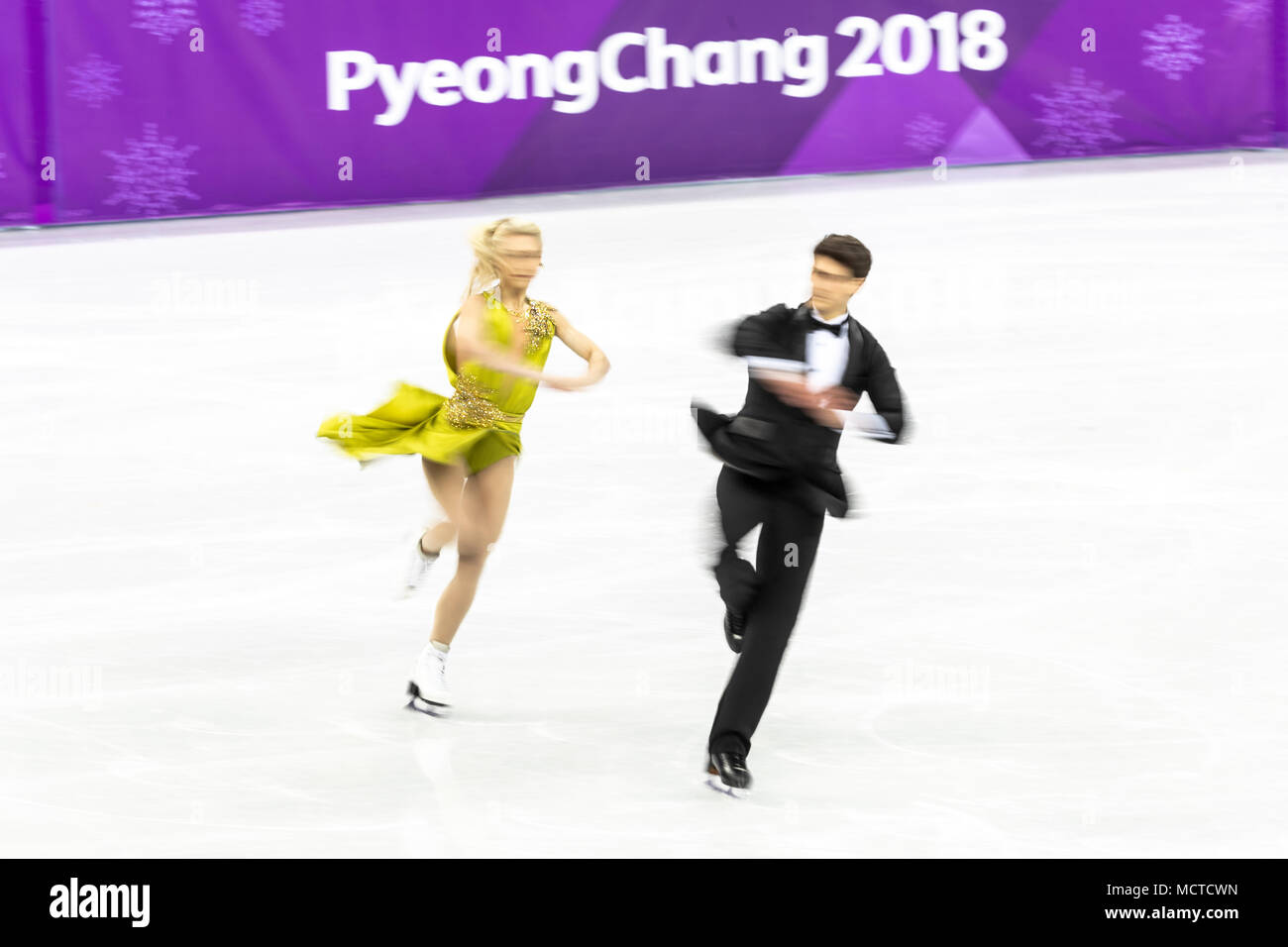 Motion blur action of Piper Gilles/Paul Poirier (CAN) in the Figure