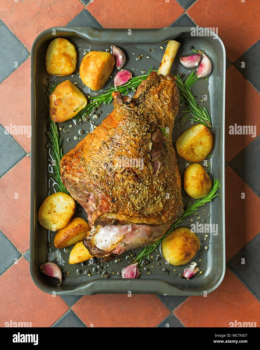 Roast leg of lamb with rosemary Stock Photo - Alamy