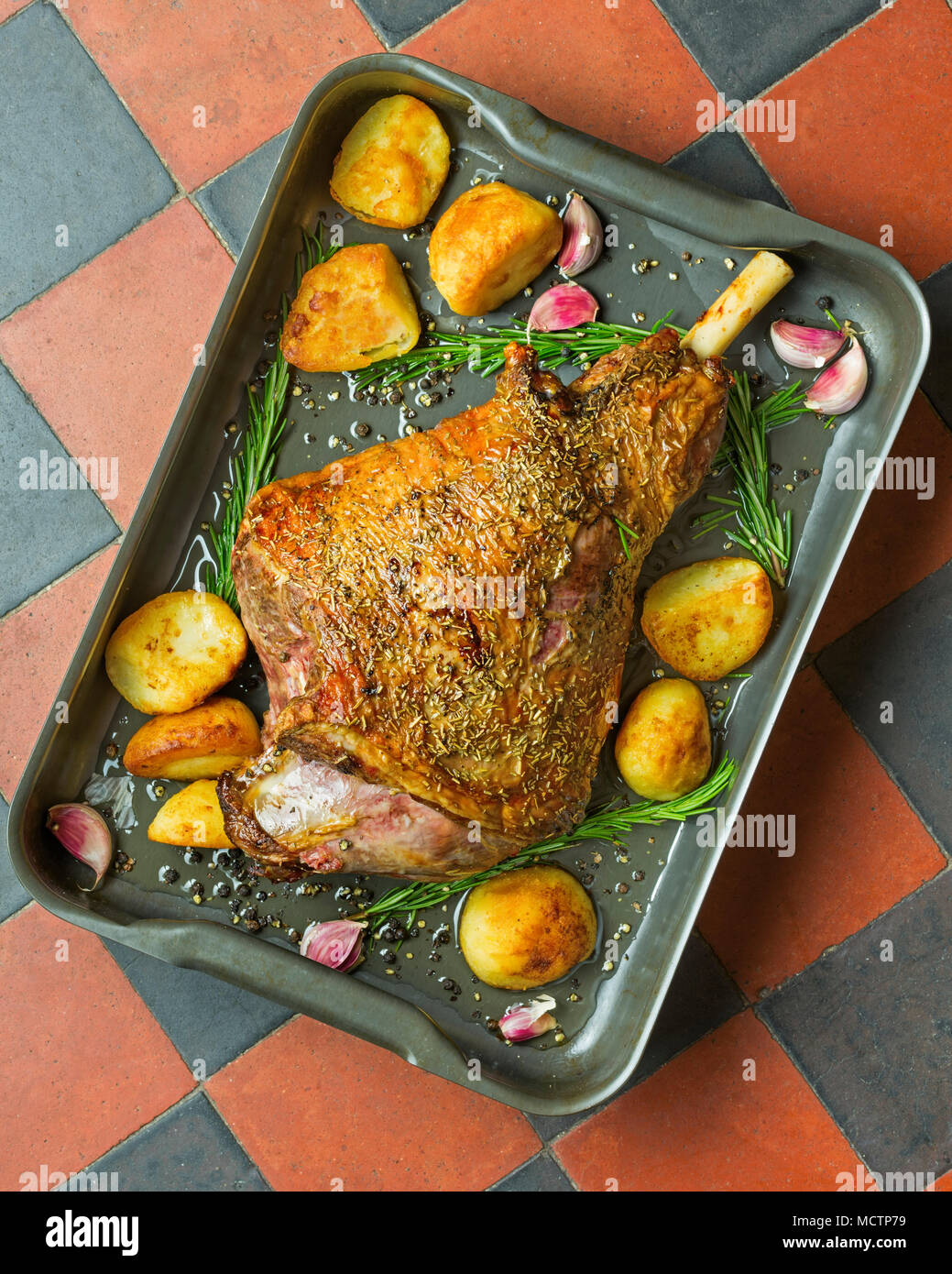 Roast leg of lamb with rosemary Stock Photo - Alamy