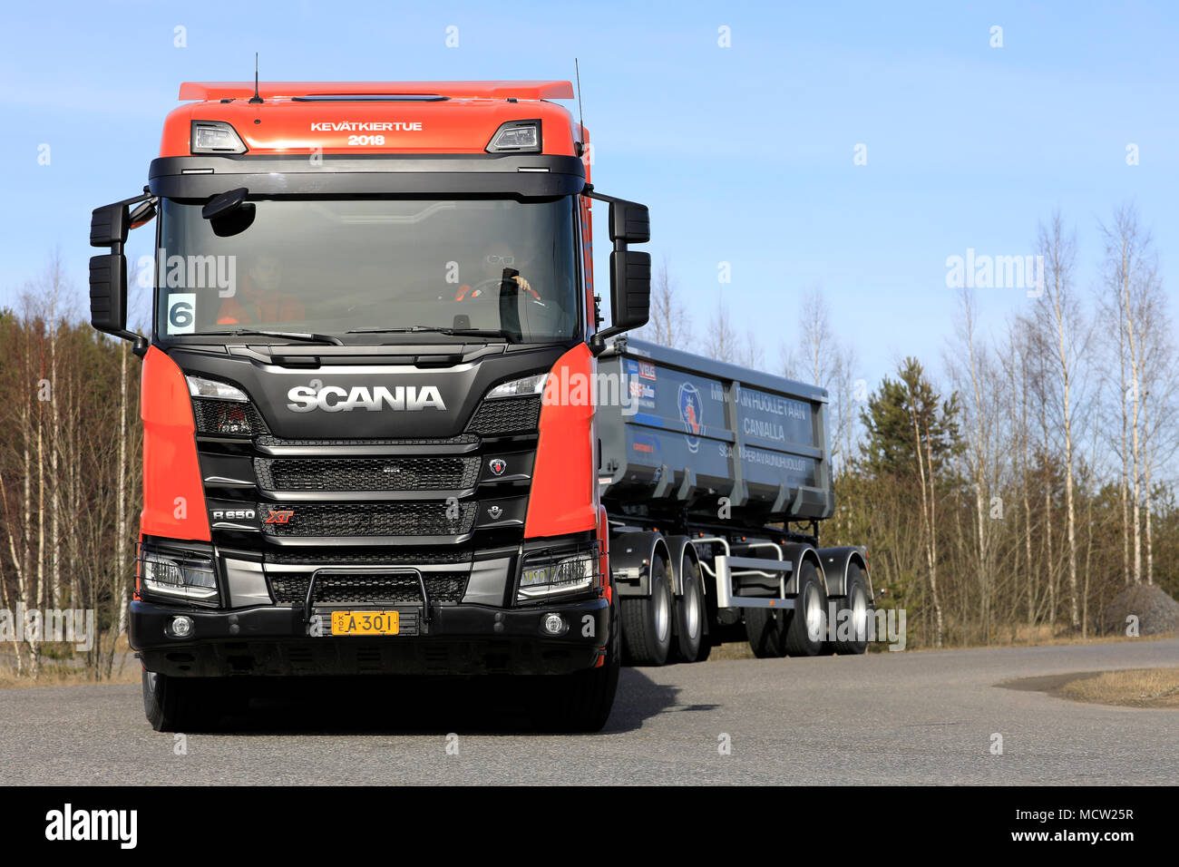 LIETO, FINLAND - APRIL 12, 2018: Front view of orange Scania R650 B10X4 XT gravel truck during road test on Scania Tour 2018 in Turku. Stock Photo