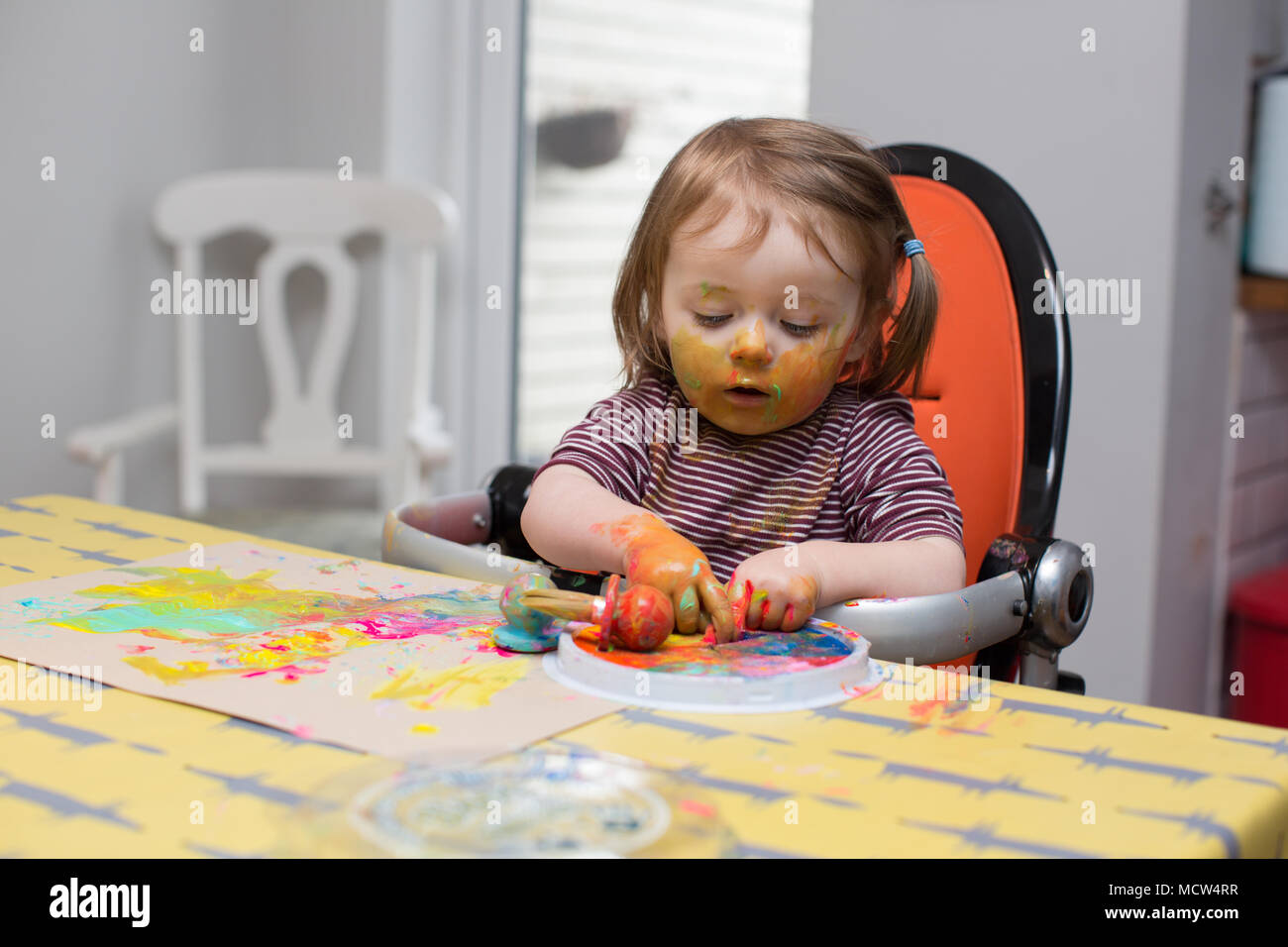 Toddler mess paint hi-res stock photography and images - Alamy