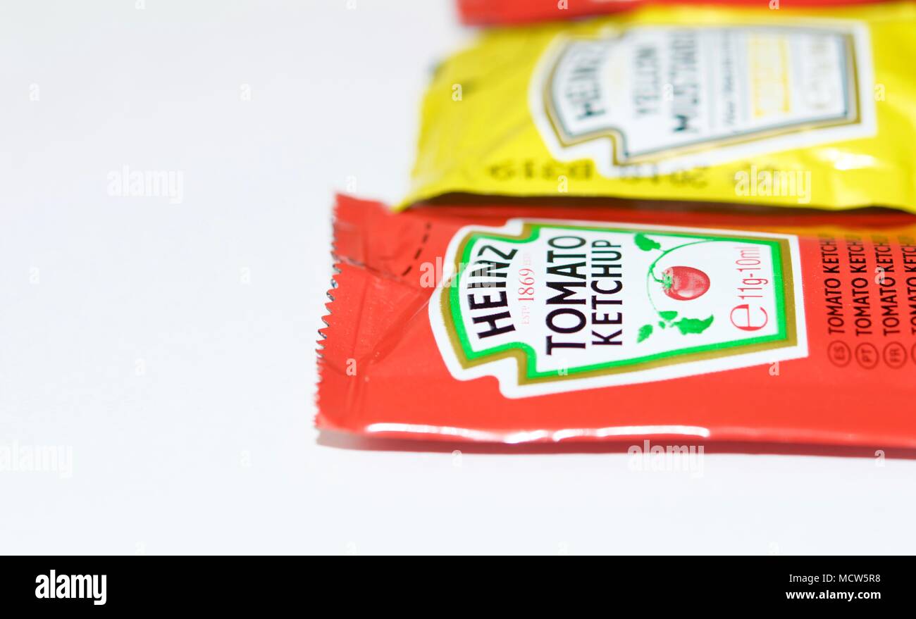 Ketchup and mustard from Heinz brand in sachets Stock Photo Alamy