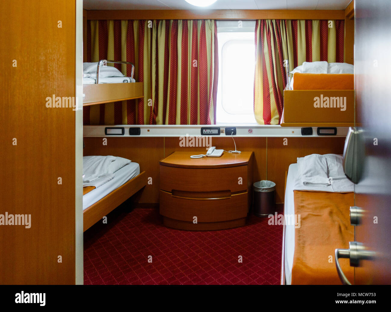 Interiors of business travel compartment with high section and low section in a train, Athens, Greece Stock Photo