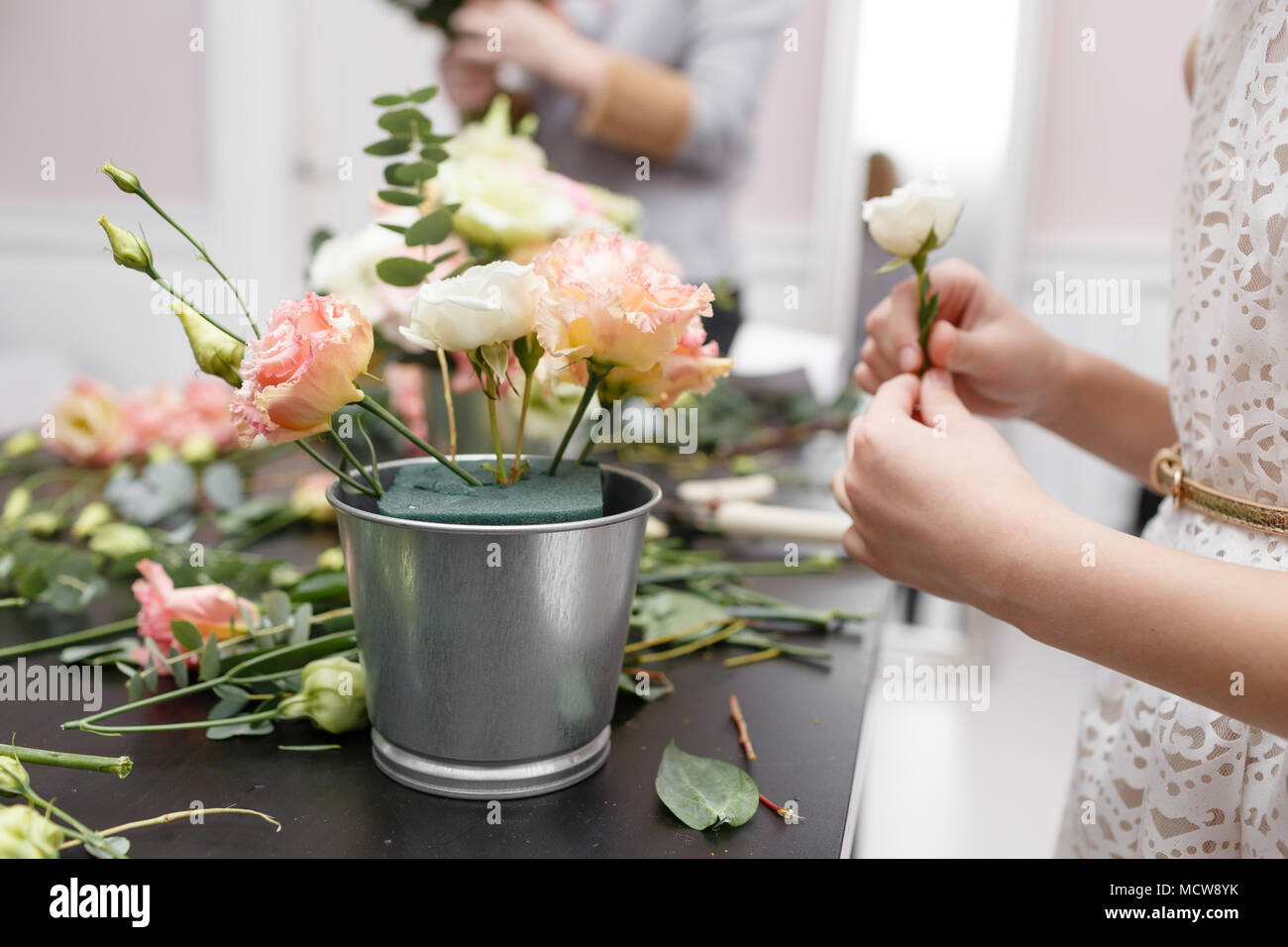 Master class on making bouquets for kids. Spring bouquet in metal ornamental flowerpot. Learning