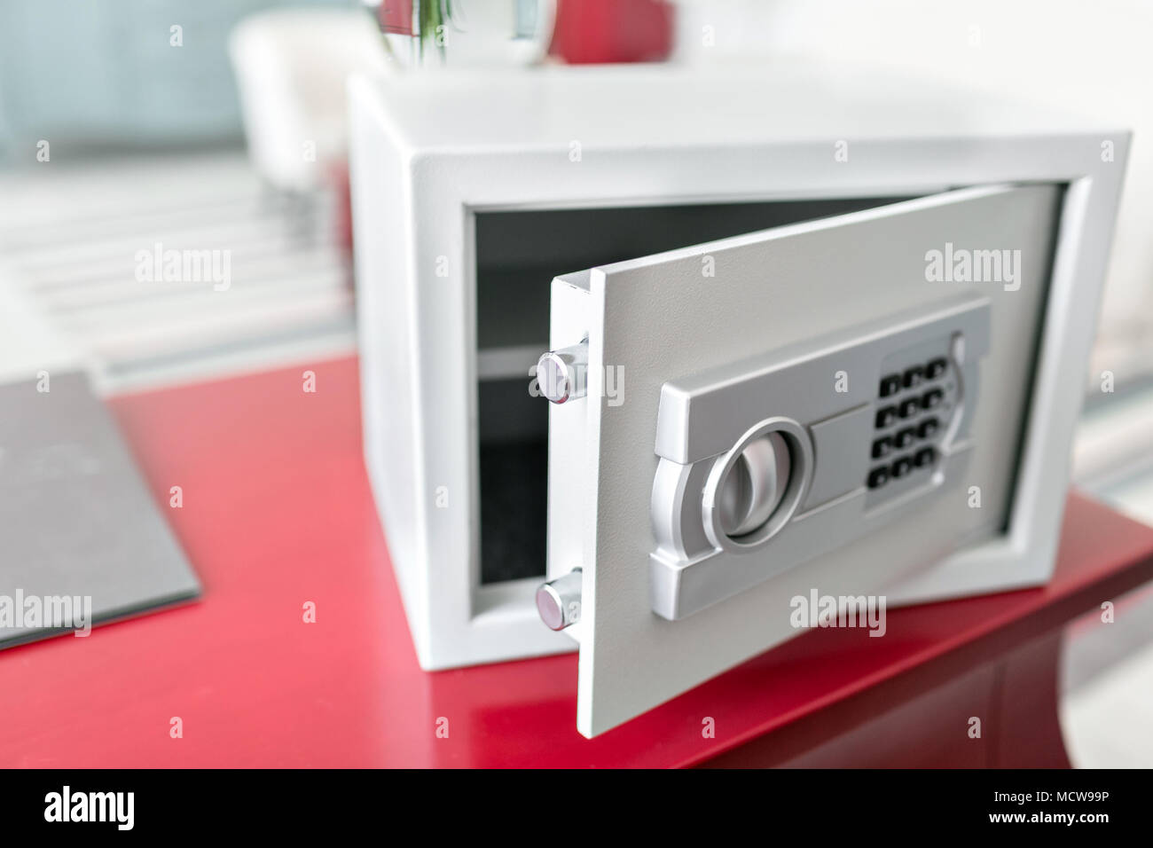 Open safe in a wealthy house. Safety box in hotel room. Concept safe
