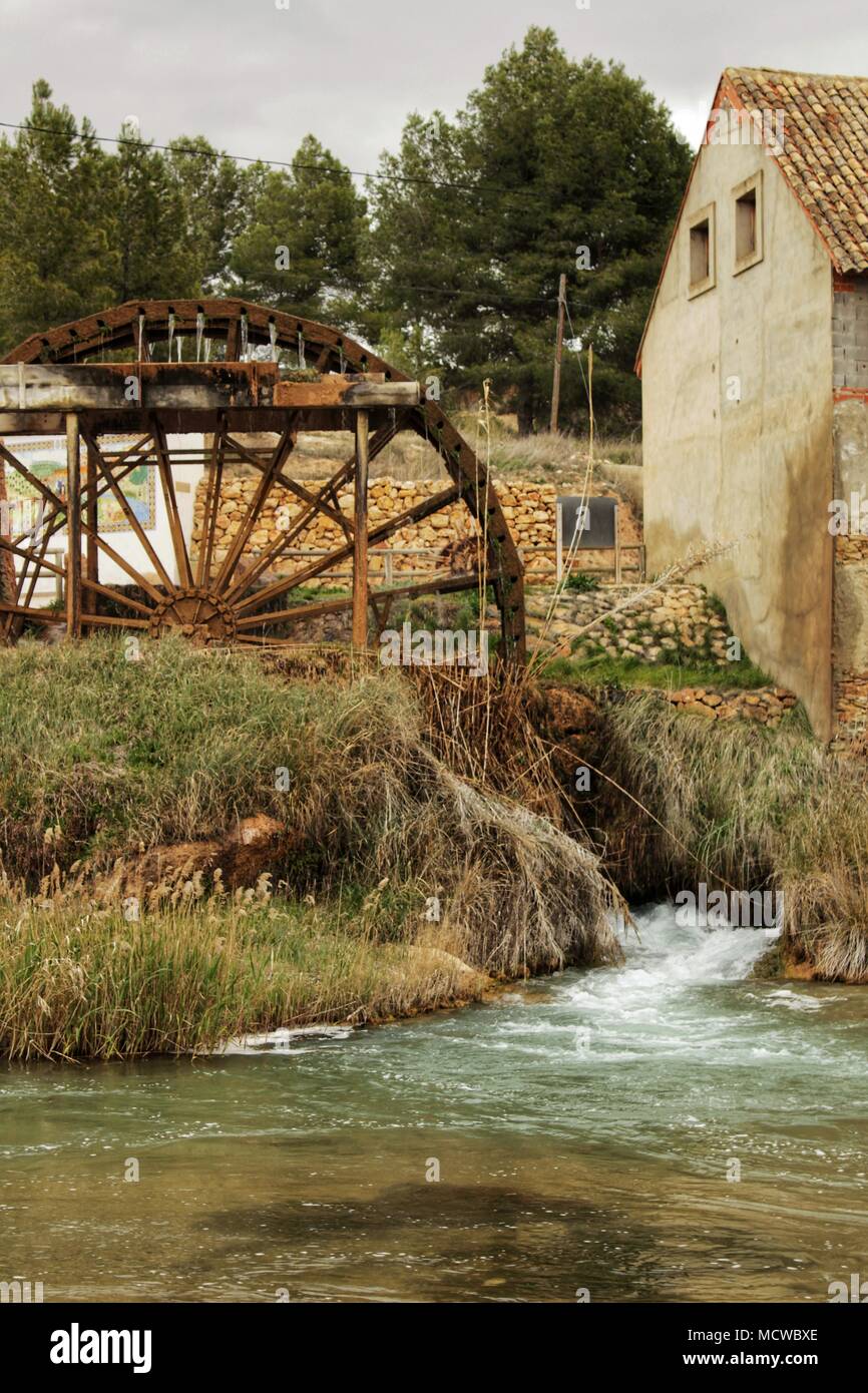 Old Wooden Waterwheel And Cabriel River On Its Way Through Casas Del Rio Village Albacete Spain Landscape Between Cane Field And Mountains Stock Photo Alamy