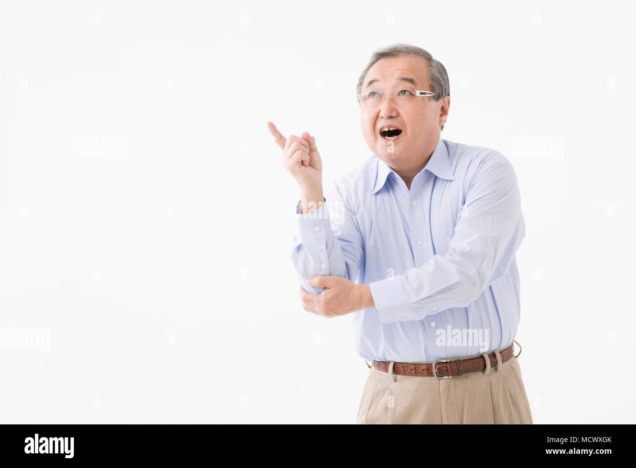 Man pointing direction elderly hi-res stock photography and images - Alamy