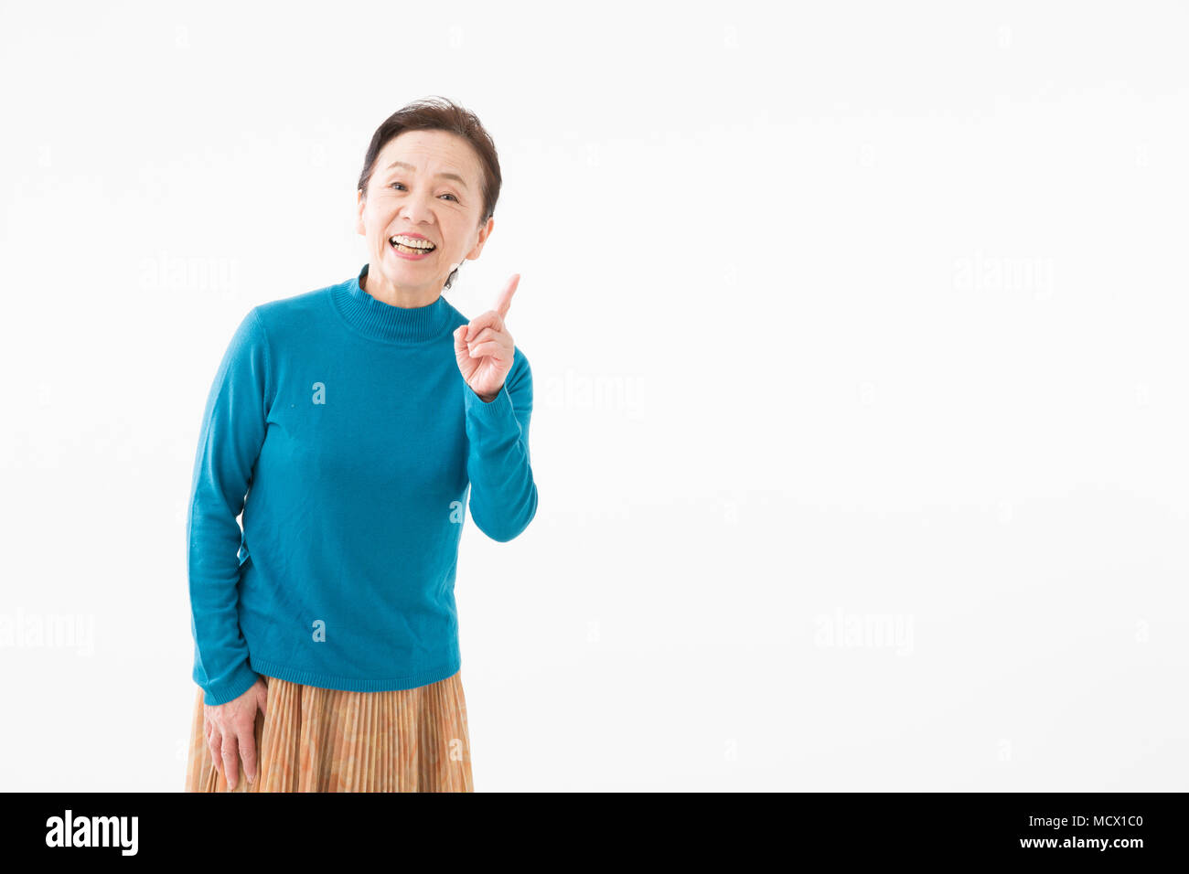 Look up pointing woman hi-res stock photography and images - Alamy
