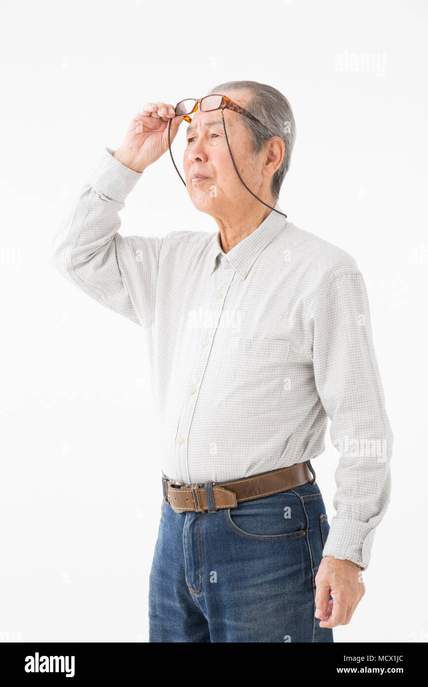 Image of presbyopia (Senior man) Stock Photo